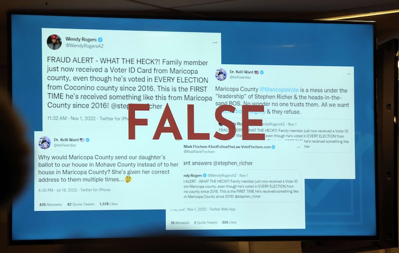 An image depicting false election information is displayed  in Phoenix, Arizona. AFP