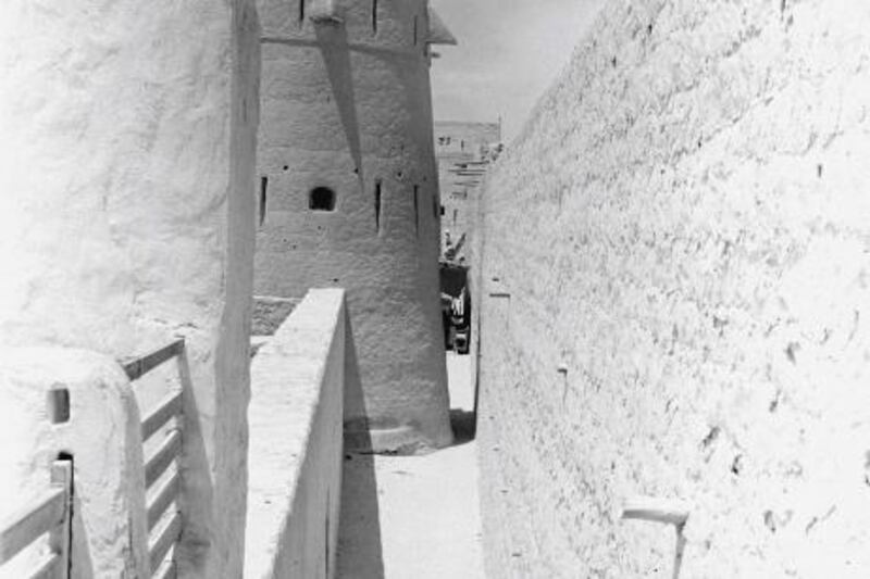 QASR AL HOSN HISTORY PROJECT 2013. Trucial Oman States, Abu Dhbai. An photograph of Abu Dhabi taken by Ronald Codrai. Image shows the oldest tower and the gap between the old and new fort following the renovations. 

Ronald Codrai © TCA Abu Dhabi