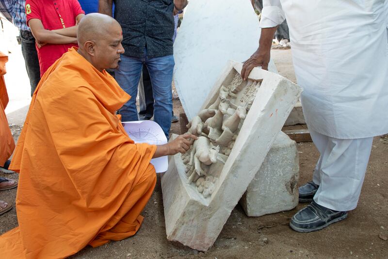 Swami Brahmavihari, head of international relations for Baps Swaminarayan Sanstha, the organisation building the temple in Abu Dhabi, checks the stone work in India. Photo: Baps Hindu Mandir
