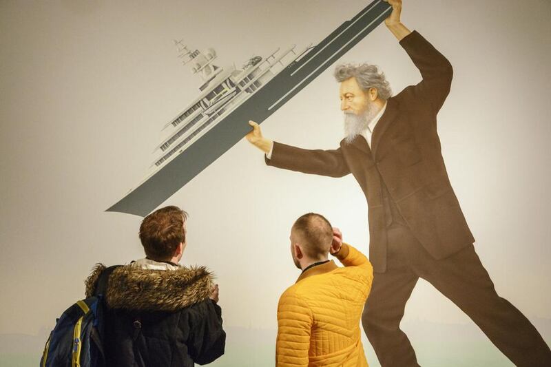 The mural We Sit Starving Amidst Our Gold, painted by Stuart Sam Hughes, shows William Morris throwing Roman Abramovich's yacht. Paul Tucker