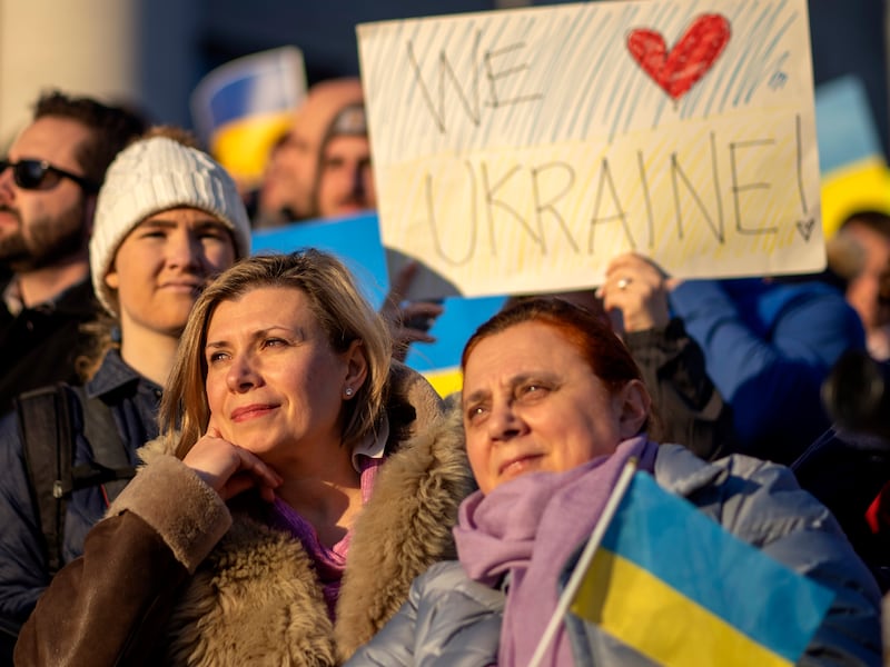 Protesters listen to speakers as they gather for a rally in support of Ukraine at the Utah Capitol in Salt Lake City. AP