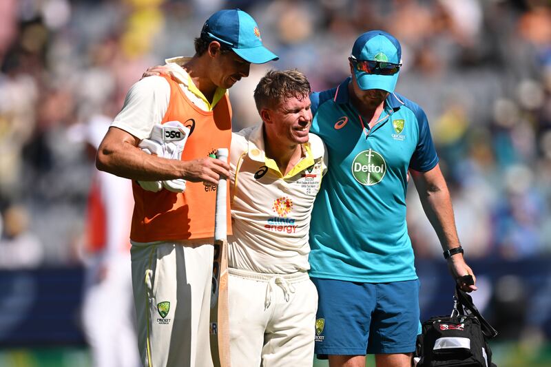 David Warner exits the field after retiring hurt after making a double century. EPA