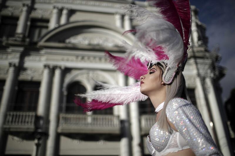 A person participates in the parade of the 'San Jose Carnival' in San Jose, Costa Rica. The festival sees people parading through the city's main avenues as part of the San Jose Celebrations that take place at the end of each year.  EPA