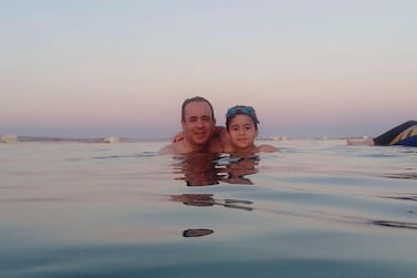 Dr Ahmed El Lawah and his son during a vacation in Egypt in 2016. El Lawah died on Monday, March 30 from coronavirus. AP