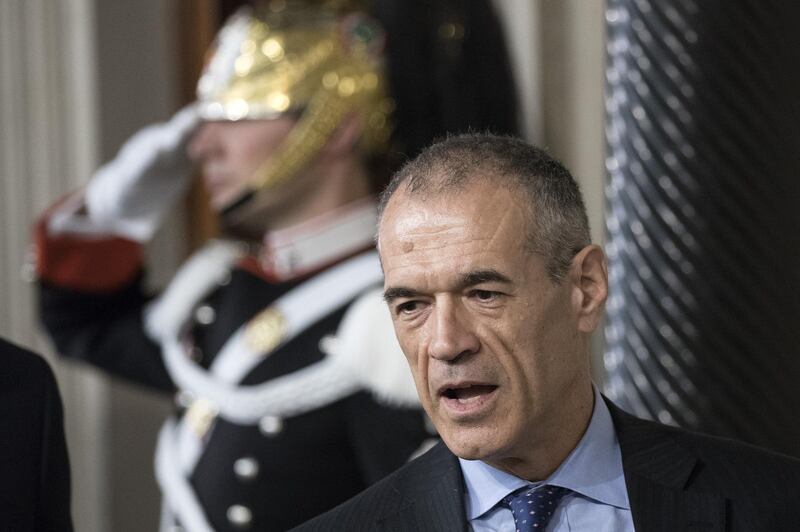 Carlo Cottarelli, Italy's premier-designate attends a news conference at the Quirinale Palace in Rome, Italy, on Monday, May 28, 2018. President Sergio Mattarella asked Cottarelli, a former executive director of the International Monetary Fund -- where he has worked for more than 25 years -- to form a government on Monday, a day after the head of state vetoed a euroskeptic, Germany-bashing economist as finance minister proposed by the Five Star Movement and League parties. Photographer: Alessia Pierdomenico/Bloomberg