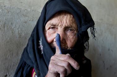 Afghan voters braved difficult circumstances to vote in the country's elections. Paula Bronstein / Getty Images