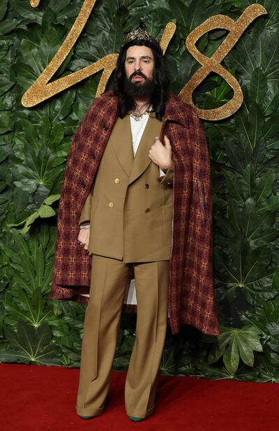 Italian fashion designer Alessandro Michele poses on the red carpet upon arrival to attend the British Fashion Awards 2018 in London on December 10, 2018. The Fashion Awards are an annual celebration of creativity and innovation will shine a spotlight on exceptional individuals and influential businesses that have made significant contributions to the global fashion industry over the past twelve months. / AFP / Daniel LEAL-OLIVAS
