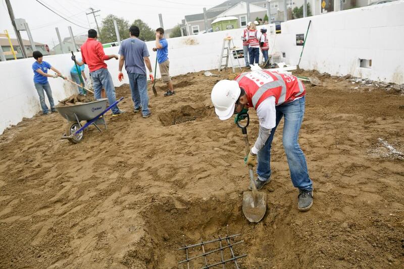 Volunteer Abed Al Blooshi digs deep for the Habitat for Humanity project.