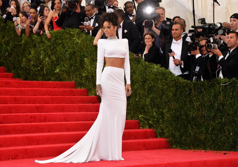 epa04196427 Barbadian singer Rihanna arrives for the 2014 Anna Wintour Costume Center Gala held at the New York Metropolitan Museum of Art in New York, New York, USA, 05 May 2014. The Costume Institute's new Anna Wintour Costume Center opens on 08 May with the exhibition 'Charles James: Beyond Fashion.'  EPA/JUSTIN LANE