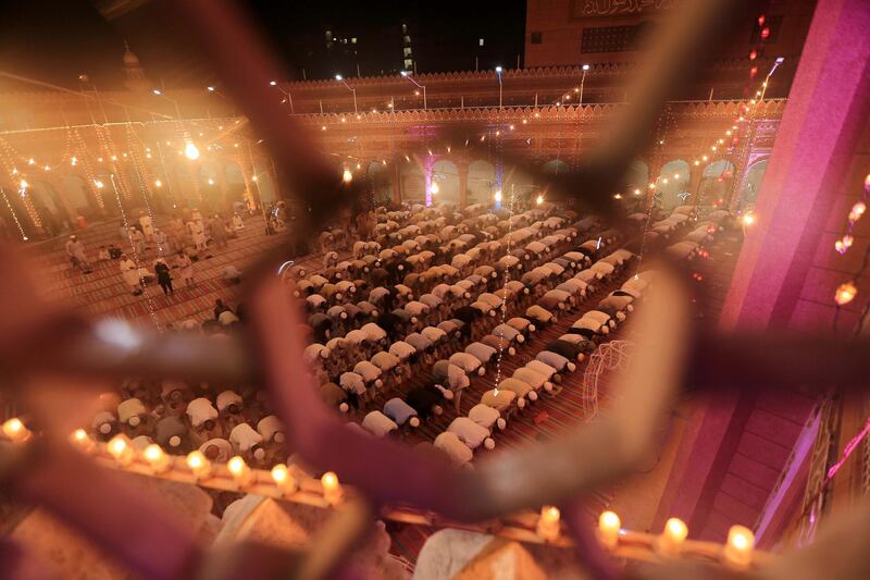 An illuminated mosque as Muslims offer special Taravih prayers in Peshawar, Pakistan. EPA