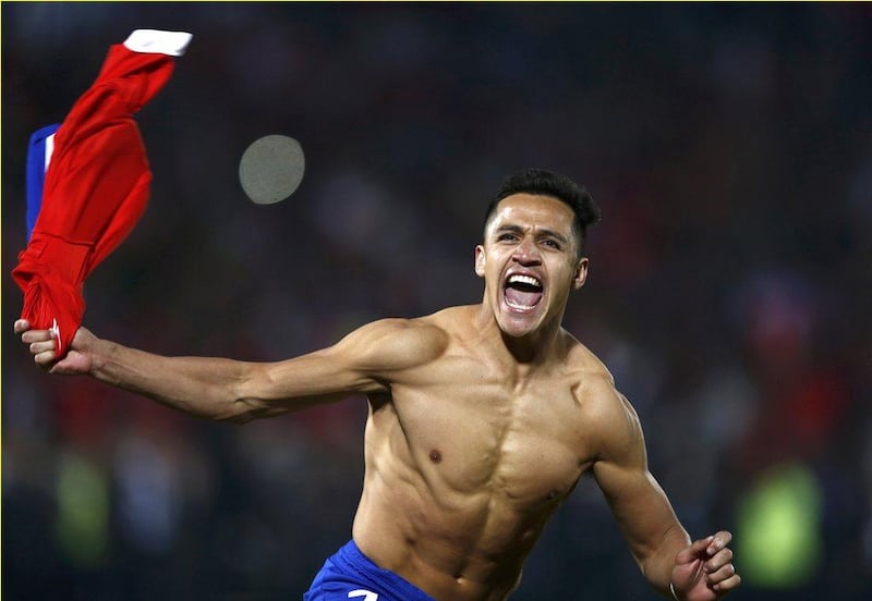 Chile's Alexis Sanchez celebrates after scoring the winning penalty kick in their Copa America 2015 final against Argentina on Saturday in Santiago. Marcos Brindicci / Reuters / July 4, 2015