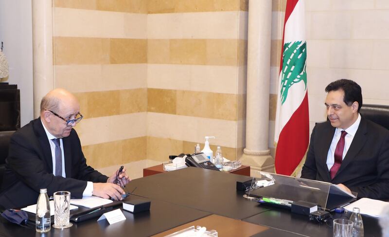 Prime Minister Hassan Diab and French Foreign Minister Jean-Yves Le Drian hold talks at the governmental palace in Beirut. AFP