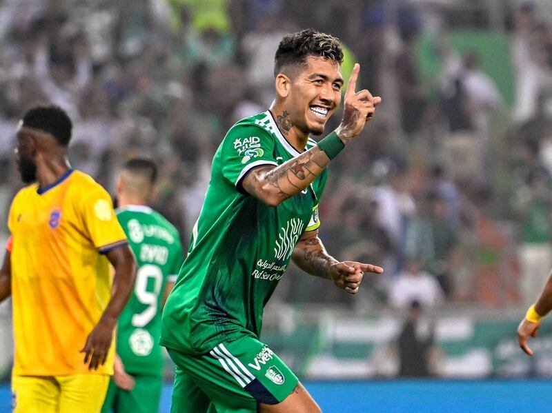 Robert Firmino celebrates scoring against Al Hazem during Al Ahli's 3-1 Saudi Pro League win at the Prince Abdullah Al Faisal Stadium in Jeddah on August 11, 2023. Roshn Saudi League