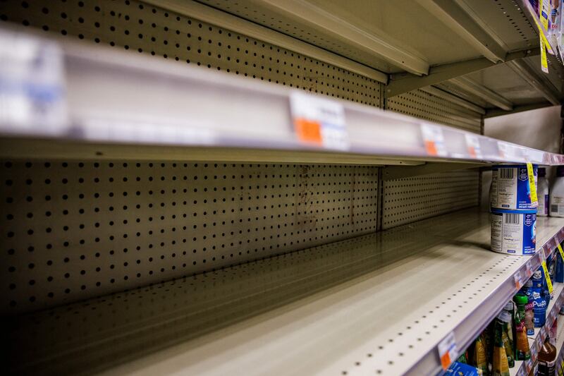 Shelves normally meant for baby formula sit nearly empty at a store in Washington. AFP