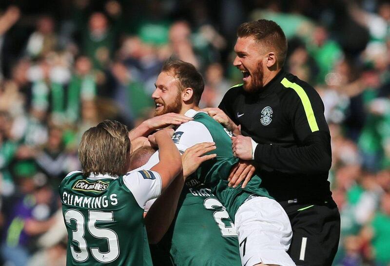Hibernian players celebrate at the end of the match after winning the Scottish Cup Final on Saturday. Russel Cheyne / Reuters / May 21, 2016 