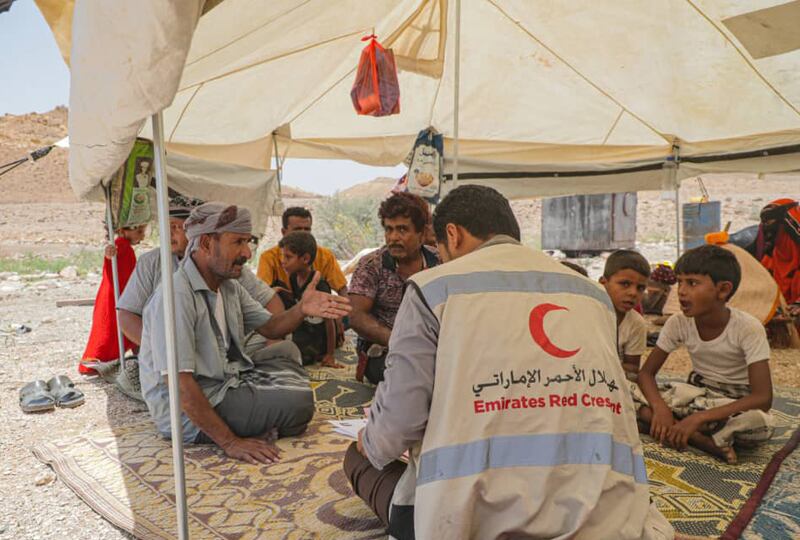 Staff from the Emirates Red Crescent's mobile clinic at work in Hadramawt governorate. The Emirati team performs check-ups on patients in rural areas that do not have health facilities. They provide treatment for many conditions.