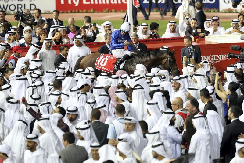 Dubai, United Arab Emirates - March 31st, 2018: Thunder Snow ridden by Christophe Soumillion (blue) wins the Dubai World Cup at the Dubai World Cup raceday 2018. Saturday, March 31st, 2018 at Meydan Race Course, Dubai. Chris Whiteoak / The National