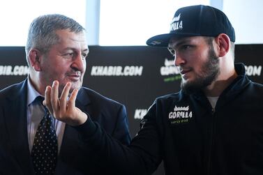 Mixed martial arts (MMA) fighter Khabib Nurmagomedov and and his father Abdulmanap Nurmagomedov give a press conference in Moscow on November 26, 2018. (Photo by Kirill KUDRYAVTSEV / AFP)