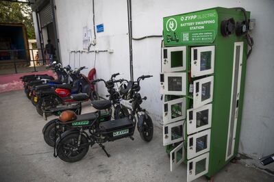 Electric scooters at a battery swapping station in Noida, Uttar Pradesh. India’s delivery companies are finding there aren’t many EV models available that can be deployed at scale. Photo: Bloomberg