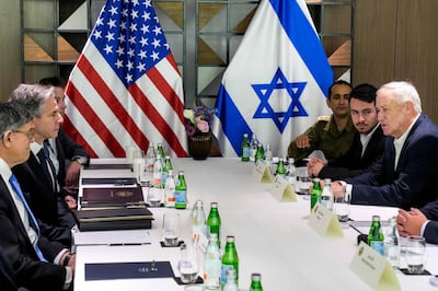 US Secretary of State Antony Blinken, left, meets former Israeli defence minister Benny Gantz during Mr Blinken's visit to Tel Aviv last month. AFP