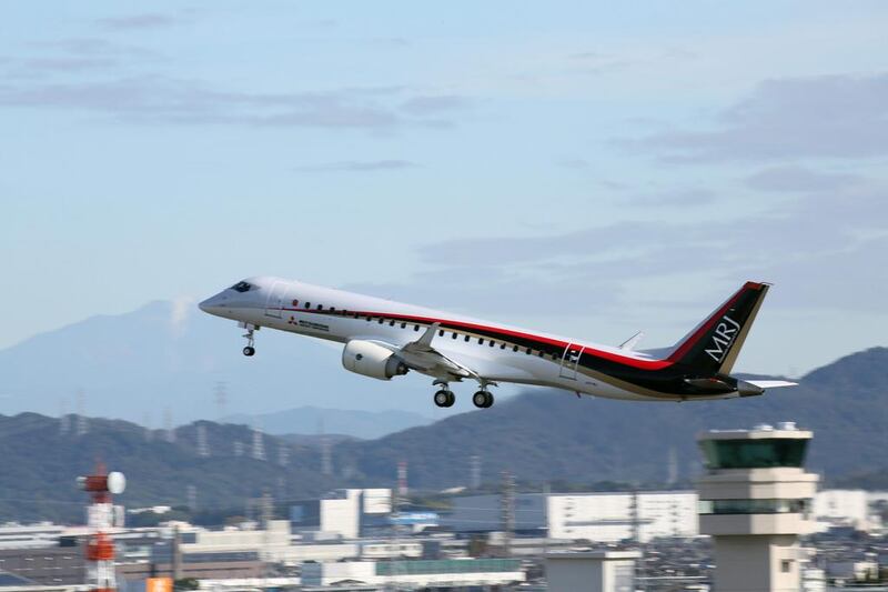 A Mitsubishi Regional Jet (MRJ) taking off for its first flight at Nagoya Airport in Toyoyama town, central Japan. The plane's delivery has been pushed back again. EPA / Mitsubishi Aircraft Corp