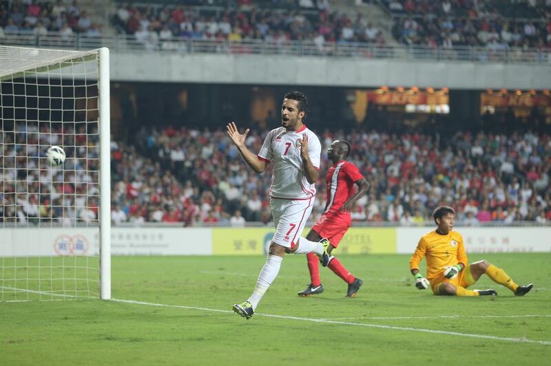 UAE’s Ali Mabkhout celebrates his and the team’s second goal on the way to a treble in a 4-1 victory in Hong Kong yesterday. Courtesy UAE FA