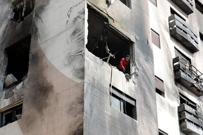 The impact of an Israeli strike on a residential building in Kafr Sousa district in Damascus in February. AFP