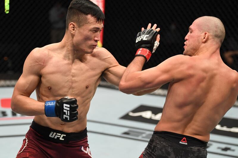 Jung Chan-sung and Brian Ortega during their featherweight bout. Getty