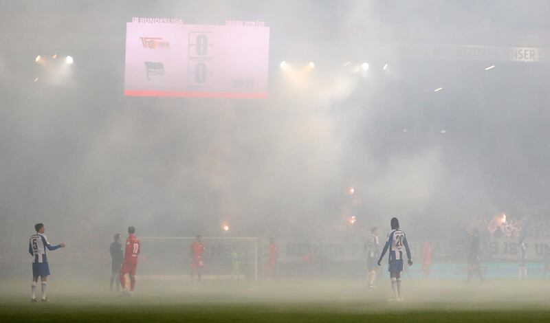 BERLIN, GERMANY - NOVEMBER 02: Smoke from flares are seen during the Bundesliga match between 1. FC Union Berlin and Hertha BSC at Stadion An der Alten Foersterei on November 02, 2019 in Berlin, Germany. (Photo by Maja Hitij/Bongarts/Getty Images)