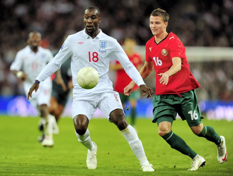 LONDON, ENGLAND - OCTOBER 14:  Carlton Cole of England and Igor Shitov of Belarus in action during the FIFA 2010 World Cup Qualifying Group 6 match between England and Belarus at Wembley Stadium on October 14, 2009 in London, England.  (Photo by Mike Hewitt/Getty Images)
