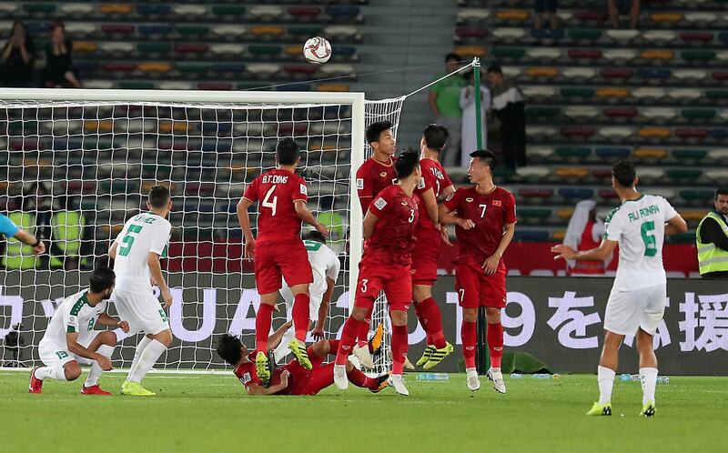 ABU DHABI , UNITED ARAB EMIRATES , January 8 – 2019 :- Ali Adnan Al Tameemi ( no 6 in white right ) of Iraq scored the goal during the AFC Asian Cup UAE 2019 football match between IRAQ vs. VIETNAM held at Zayed Sports City in Abu Dhabi. Iraq won the match by 3-2. ( Pawan Singh / The National ) For News/Sports