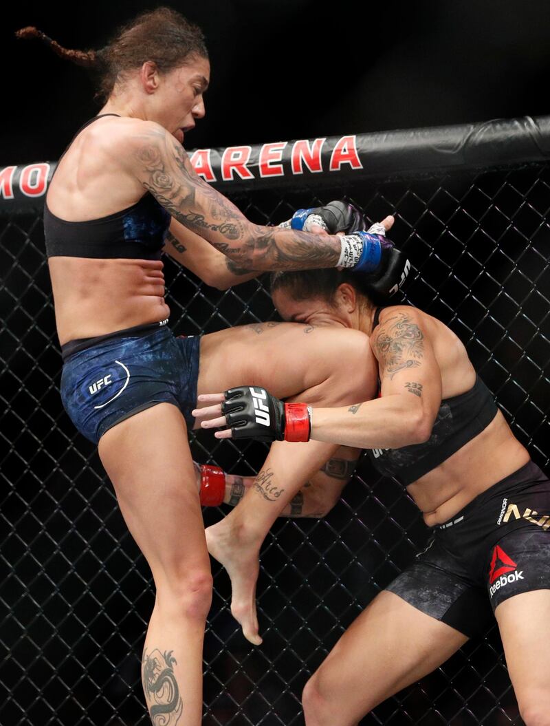 Germaine de Randamie lands a knee to Amanda Nunes. AP