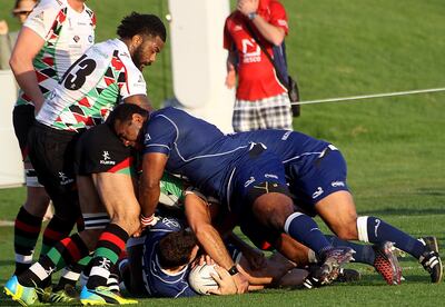 Abu Dhabi, Jan, 19, 2018: Abu Dhabi Harlequins ( Green) and Jebel Ali Dragons (Blue) in action at the Zayed sports city in Abu Dhabi . Satish Kumar for the National / Story by Paul Radley