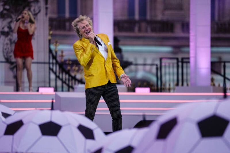 Rod Stewart involves the crowd in a rendition of Neil Diamond's latter-day football anthem 'Sweet Caroline'. Getty