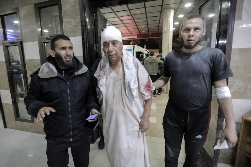 Palestinians injured in air strikes arrive at Nasser Medical Hospital in Khan Younis, Gaza. Getty Images