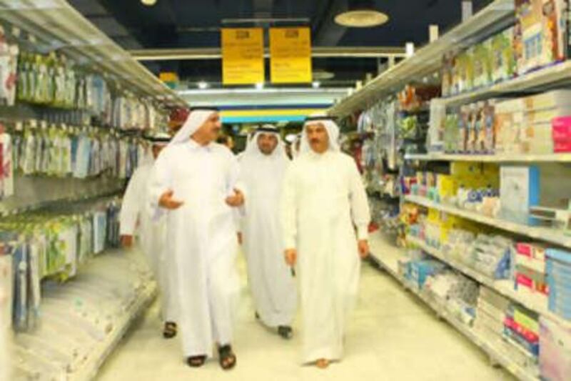 Sultan bin Saeed al Mansouri (right) with Majid Hamad Rahma al Shamsi (Chairman of Union Coop, left) at the Union Cooperative Society-Al Awir.