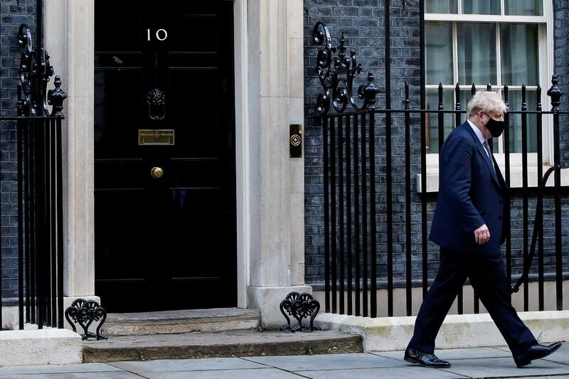 British Prime Minister Boris Johnson walks outside Downing Street in London on Wednesday. Reuters