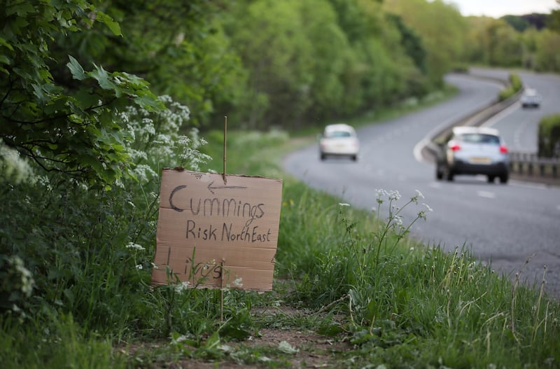 A cardboard sign is pictured near the home of the parents of Dominic Cummings, special advisor for Britain's Prime Minister Boris Johnson, following the outbreak of the coronavirus disease (COVID-19), Durham, Britain, May 25, 2020. REUTERS/Lee Smith