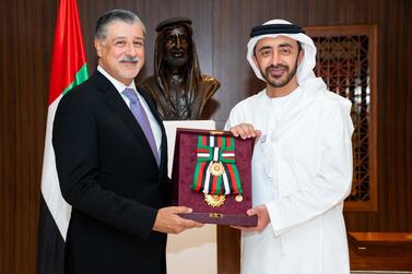 Sheikh Abdullah bin Zayed, Minister for Foreign Affairs and International Cooperation, presents the Order of Zayed (first class) to Adnan Amin, director general of Irena. Wam
