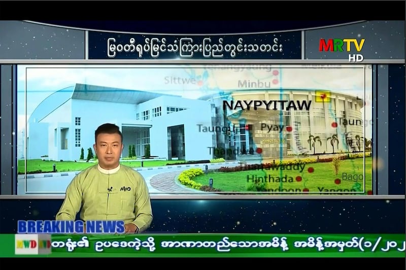 This screengrab provided via AFPTV and taken from a broadcast by Myanmar Radio and Television (MRTV) in Myanmar shows the announcement of a one-year state of emergency in the country. AFP