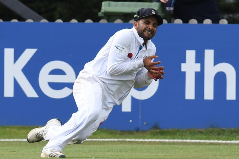 Derbyshire's Hamidullah Qadri takes the catch to dismiss Australia's Steve Smith on day two of the three-day friendly cricket match between Derbyshire and Australia at the County Ground in Derby, central England on August 30, 2019. - Australia star Steve Smith batted in his first match since being concussed during a tour-game against Derbyshire at Derby on August 30. (Photo by Paul ELLIS / AFP) / RESTRICTED TO EDITORIAL USE. NO ASSOCIATION WITH DIRECT COMPETITOR OF SPONSOR, PARTNER, OR SUPPLIER OF THE ECB