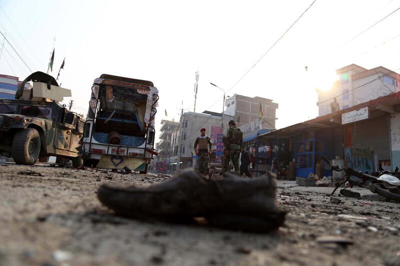 epa06365052 Afghan security officials inspect the scene of a suicide bomb blast in Jalalabad, Afghanistan, 03 December 2017. At least six people were killed and thirteen were injured in the incident. Since the end of NATO combat mission in January 2015, Kabul has been losing ground to insurgents and now controls only 57 percent of the country, according to the US.  EPA/GHULAMULLAH HABIBI