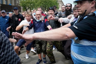Showing little care for the pandemic, Black Lives Matter protesters and counter demonstrators faced off with each other in Bolton, England, last month. Getty Images