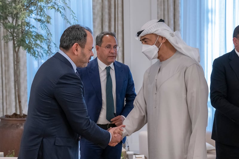 President Sheikh Mohamed receives condolences from a member of the Libyan delegation at Al Shati Palace on the death of Sheikh Khalifa. 