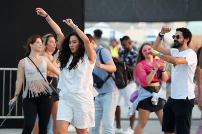 Revellers at day one of Ultra Abu Dhabi. Pawan Singh / The National