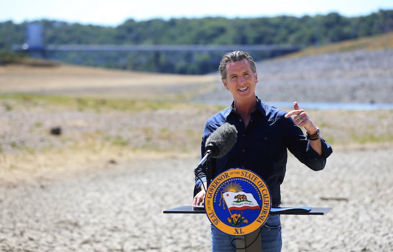 Mr Newsom asked people to voluntarily reduce their water use by 15 per cent in the middle of the drought.  Kent Porter / The Press Democrat via AP