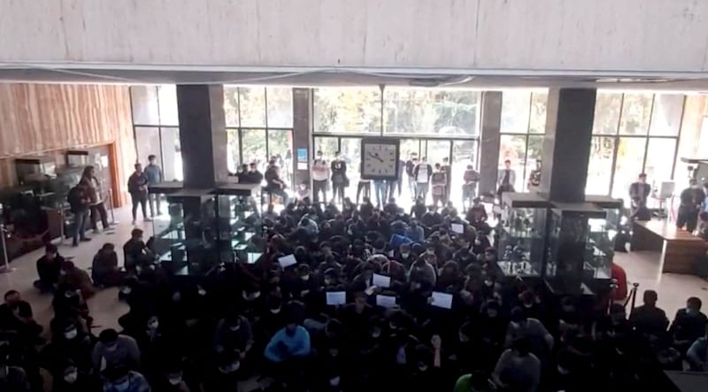 Protesters chant at a vigil for Amini at the Khajeh Nasir Toosi University of Technology in Tehran. Reuters