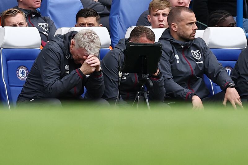 West Ham manager David Moyes with his head in hands at Stamford Bridge. AFP