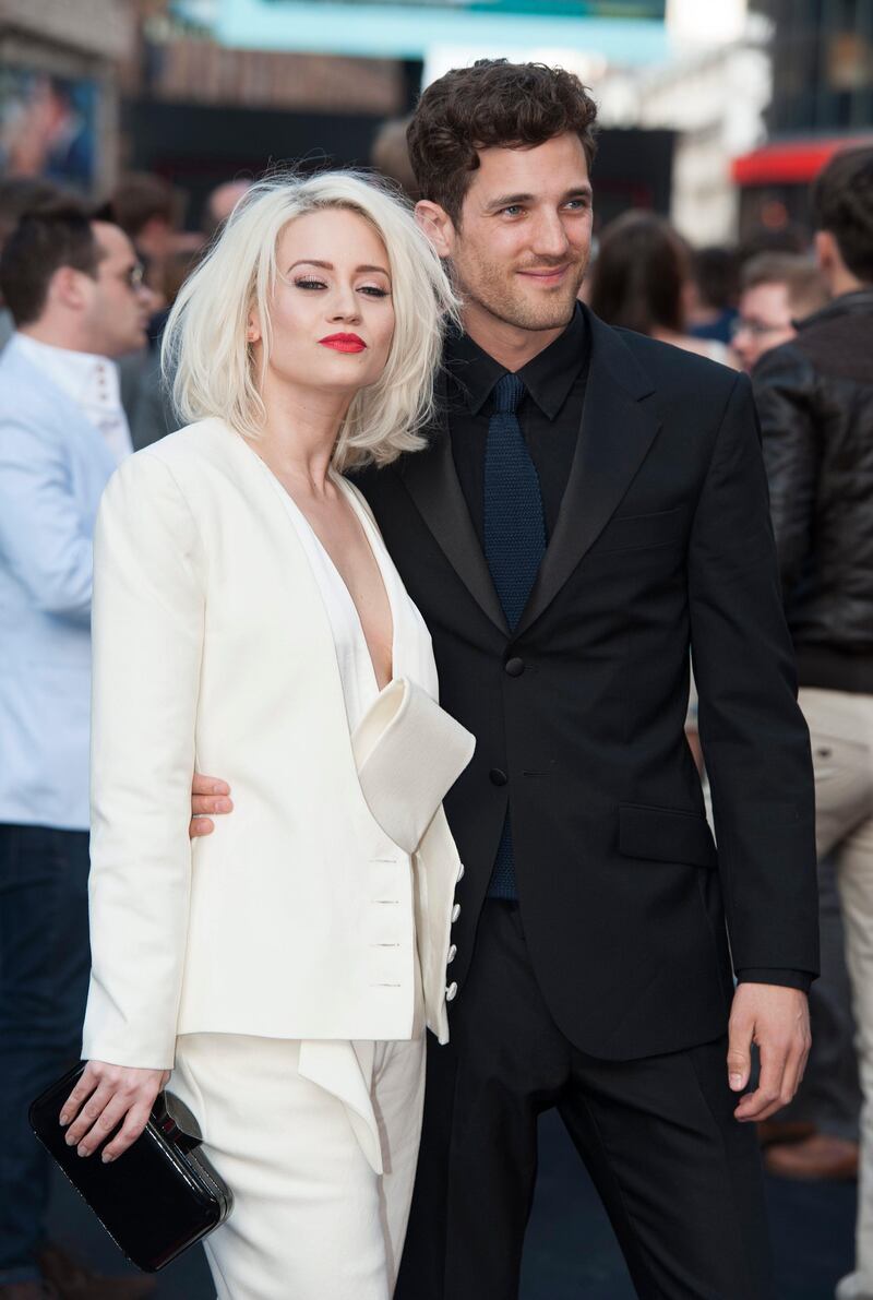 epa03728374 US singer Kimberly Wyatt (L) and fashion model Max Rogers (R) attend  the World premiere of 'World War Z' at the Empire, on Leicester Square in London, Britain, 02 June 2013. The movie opens in British theaters on 21 June.  EPA/DANIEL DEME *** Local Caption ***  03728374.jpg