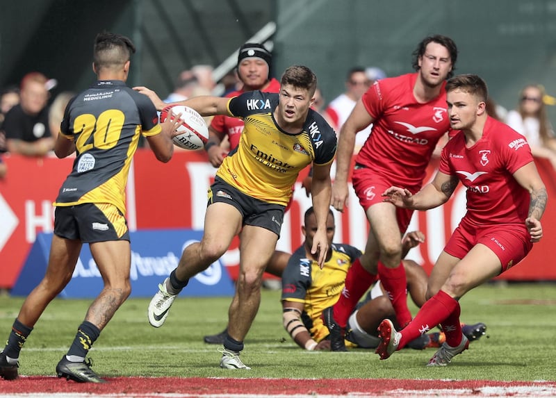Dubai, United Arab Emirates - December 07, 2019:  Hamish Anderson of Hurricanes beats the defence of Bahrain during the game between Dubai Hurricanes vs Bahrain in the Gulf mens final in the HSBC rugby sevens series 2020. Saturday, December 7th, 2019. The Sevens, Dubai. Chris Whiteoak / The National